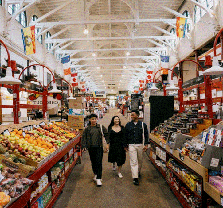 People walking in a market
AI-generated content may be incorrect.